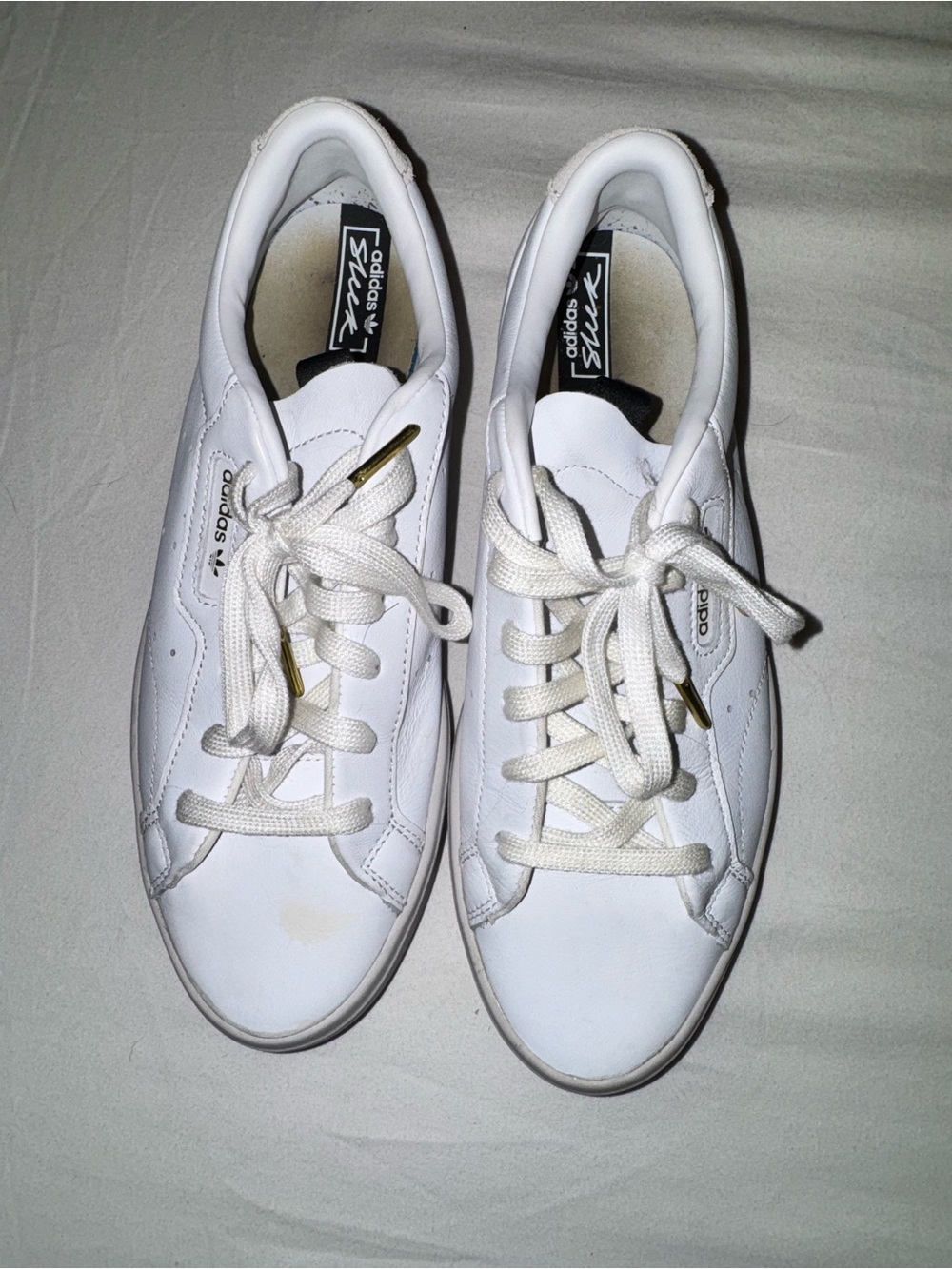 adidas White Sneakers with Black Heel Tab